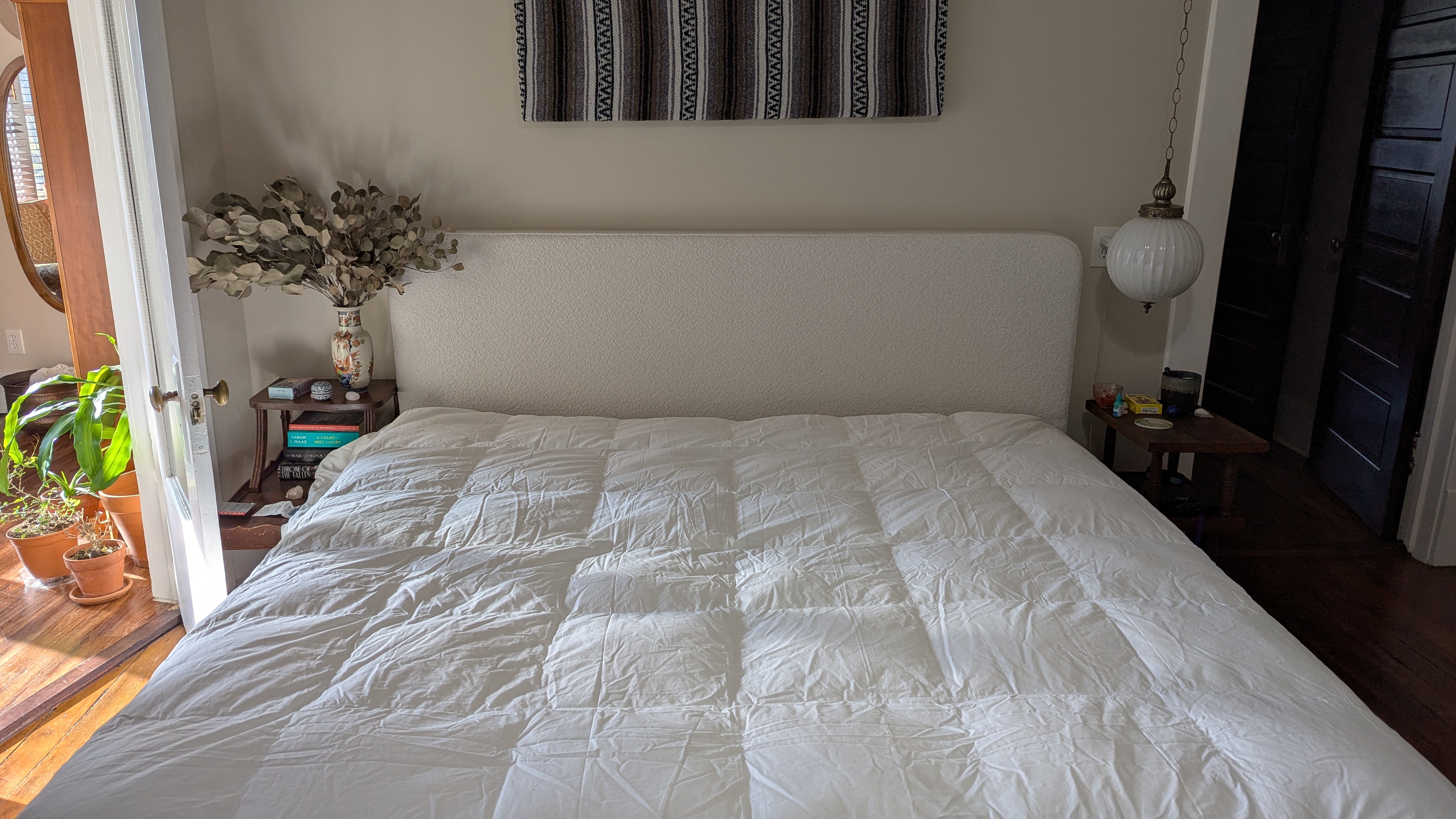 A white down comforter in bed