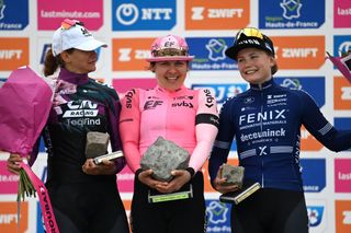 Katia Ragusa (Liv Racing-Teqfind) and Marthe Truyen (Fenix-Deceuninck) flank winner Alison Jackson after Paris-Roubaix Femmes 2023
