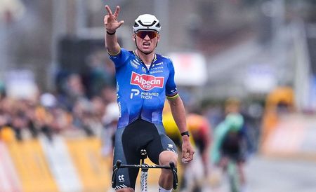 Alpecin-Premier Tech's Dutch rider Mathieu van der Poel celebrates as he crosses the finish line to win the 'E3 Classic', one day cycling race, 208.8 km from and to Harelbeke, on March 27, 2026. (Photo by DAVID PINTENS / Belga / AFP) / Belgium OUT
