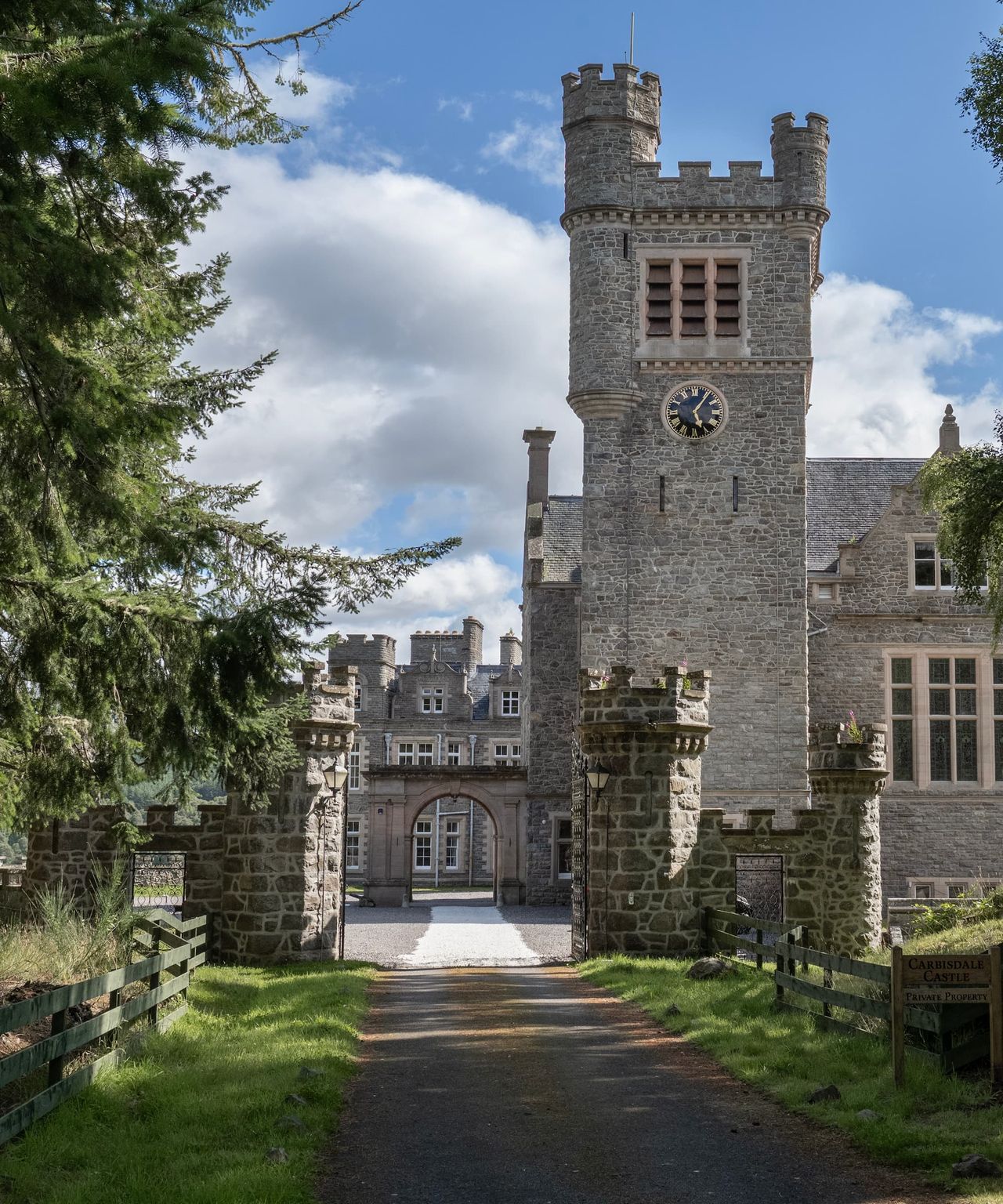 A driveway leading up to a castle