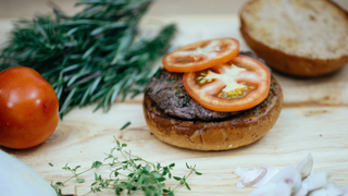 Image of mushroom burger with tomatoes