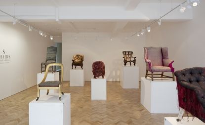 8 period chairs in a exhibition