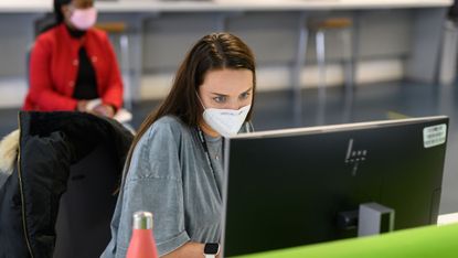 A student at her laptop during the pandemic