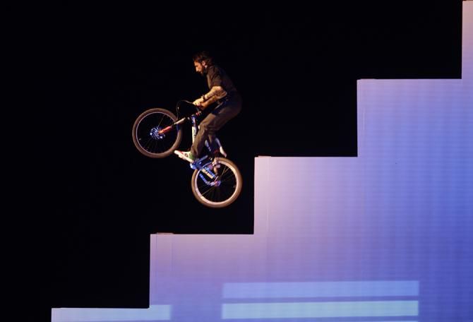 Vittorio Brumotti performs with his bike during the announcement ceremony of Dubai Tour 2014