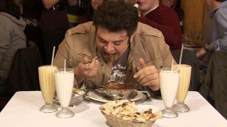 Adam Richman eating the spiciest curry in the world