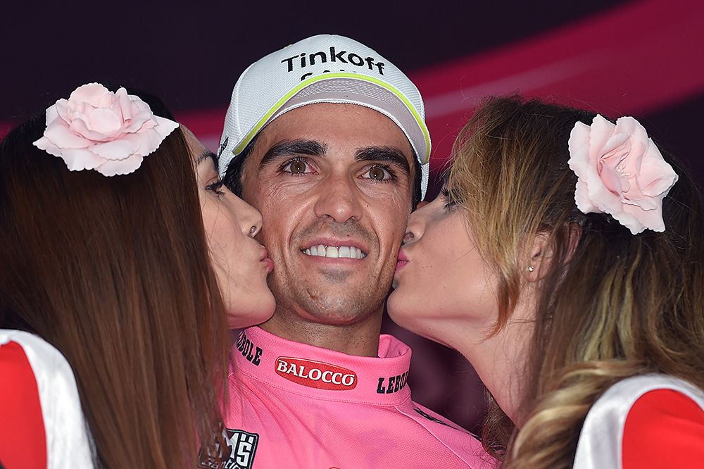 Alberto Contador (Tinkof-Saxo) gets his podium kisses