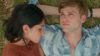 A close up shot of Emma and Dexter lying on some grass in One Day, one of the best Netflix shows of 2024