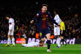 Lionel Messi celebrates after scoring his second goal for Barcelona against AC Milan in the Champions League in March 2013.