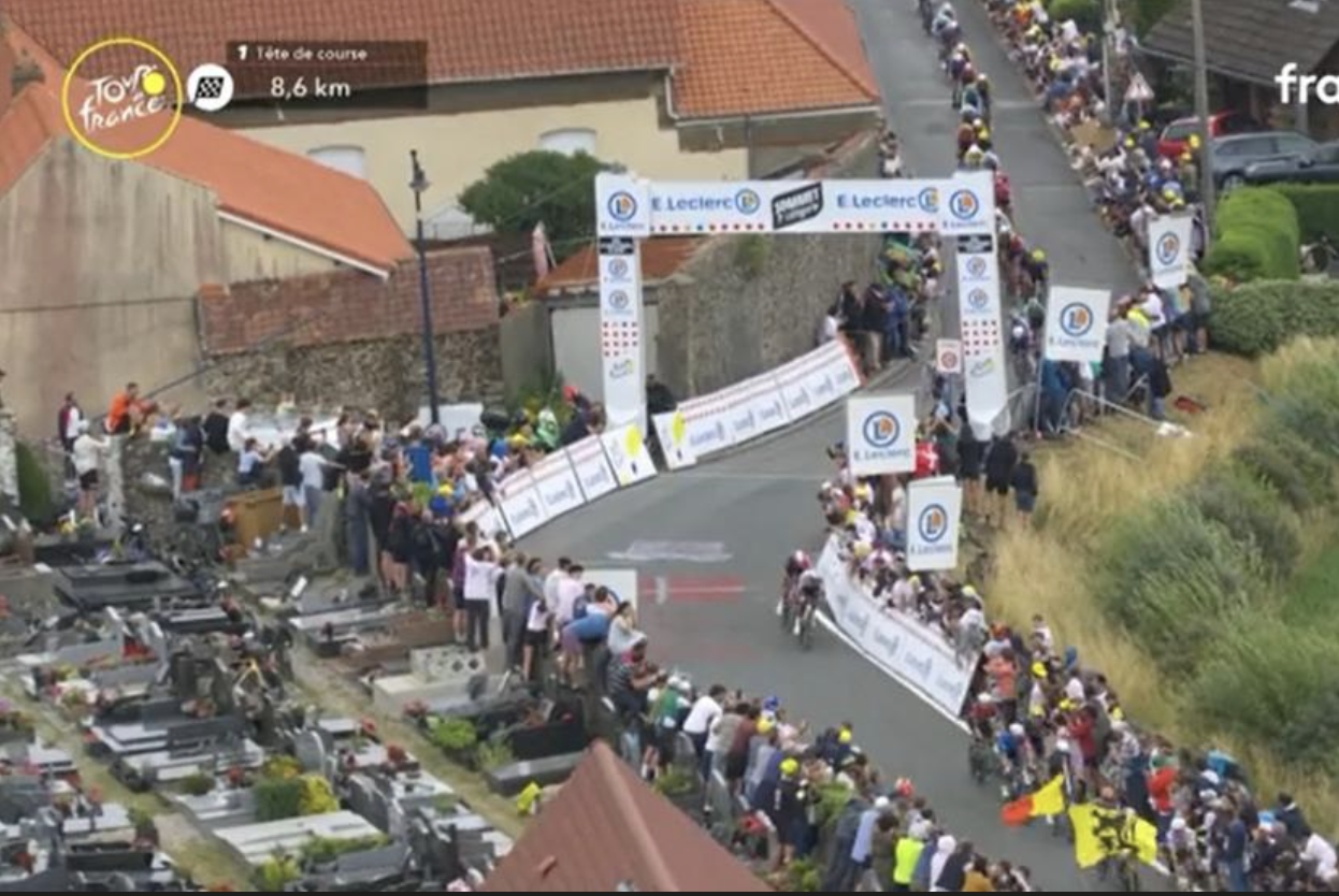 Tour de France stage 2: spectators mass on gravestones close to the finish