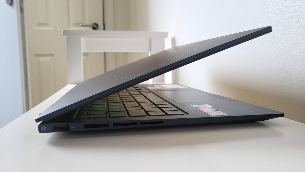 Asus Zenbook OLED 15 (2023) on a shelf