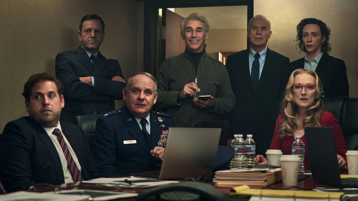 Jonah Hill, Paul Guilfoyle, Mark Rylance, and Meryl Streep sit together in a briefing room in Don&#039;t Look Up.