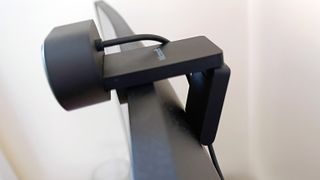 A black Microsoft Modern Webcam perched on a monitor