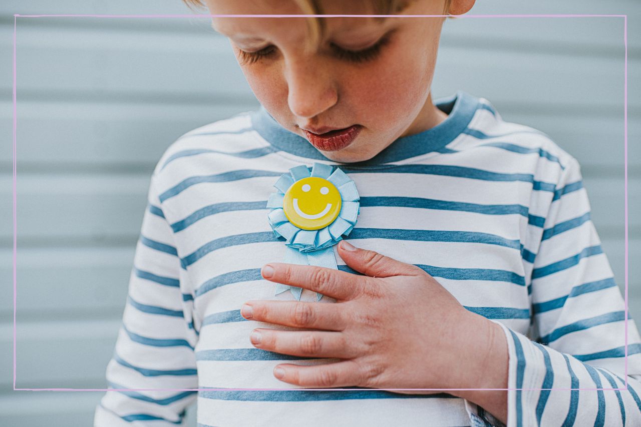 child wearing rosette