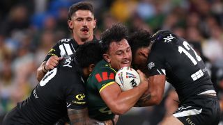 Tino Fa'asuamaleaui of Australia is tackled during the 2026 Men's Rugby League World Cup match between Australia Kangaroos and New Zealand Kiwis at Allianz Stadium on October 15, 2026 in Sydney, Australia.