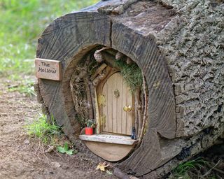fairy house inside a hollow log