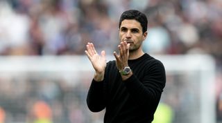 Arsenal manager Mikel Arteta applauds the fans at full-time of the Premier League match between West Ham United and Arsenal at the London Stadium on April 16, 2023 in London, United Kingdom.