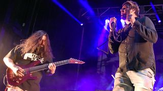 Stephen Carpenter (L) and Chino Moreno of Deftones perform during Riot Fest at National Western Complex on September 2, 2016 in Denver, Colorado