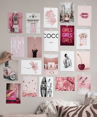 Pink wall art collage on gray wall from Desenio