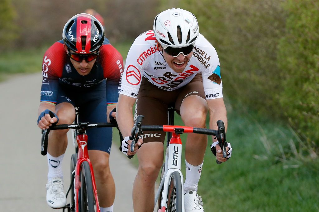 VALKENBURG NETHERLANDS APRIL 10 LR Michal Kwiatkowski of Poland and Team INEOS Grenadiers and Benoit Cosnefroy of France and AG2R Citren Team compete in the breakaway during the 56th Amstel Gold Race 2022 Mens Elite a 2541km one day race from Maastricht to Valkenburg AGR2022 WorldTour on April 10 2022 in Valkenburg Netherlands Photo by Bas CzerwinskiGetty Images