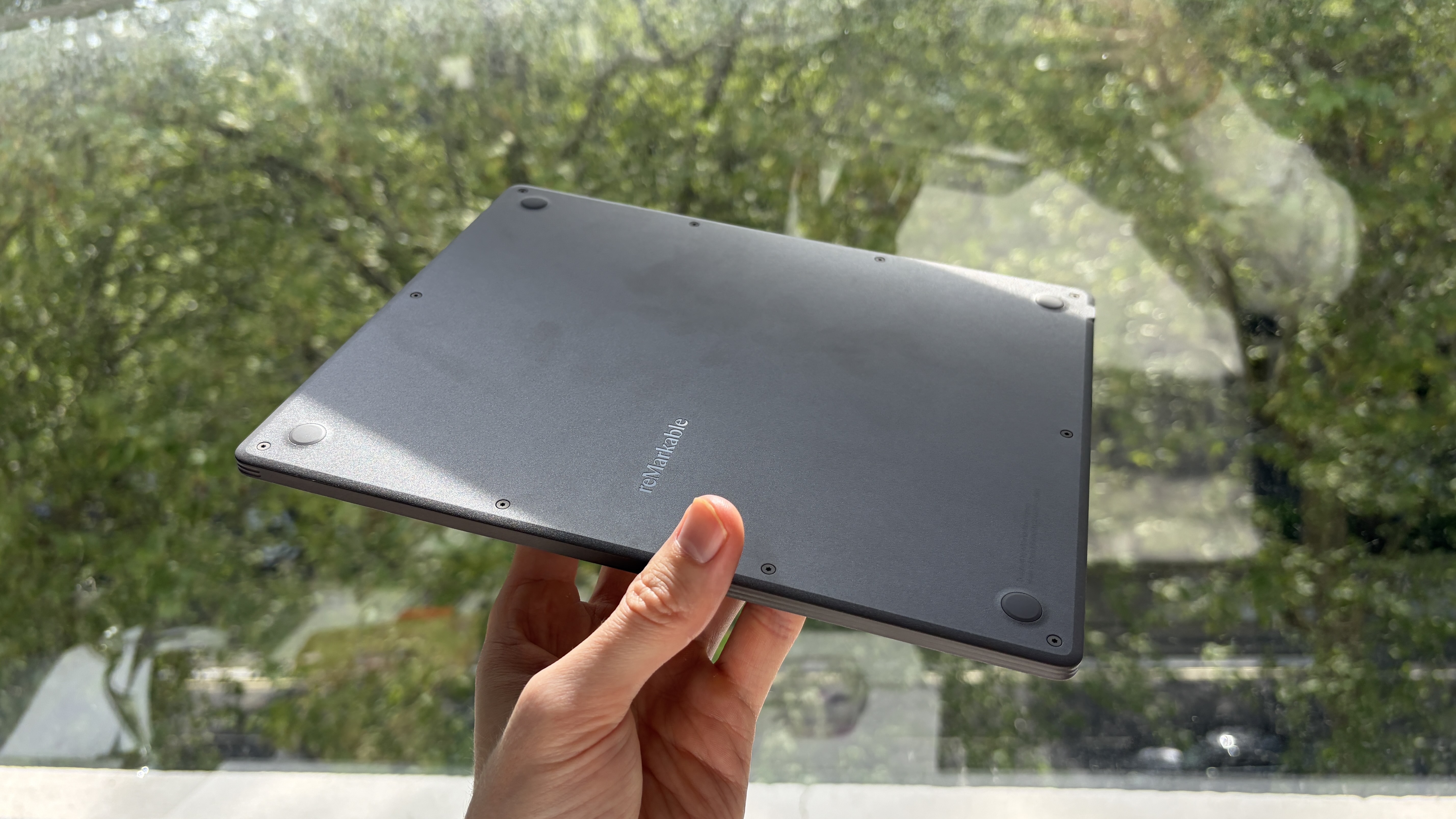 The reMarkable Paper Pure being held in the hand