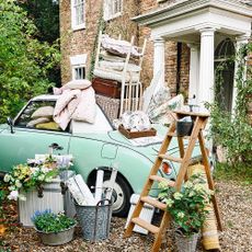 car wooden lader chair and potted plant