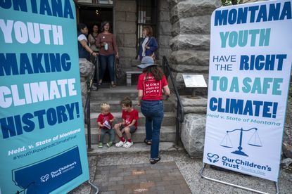 Signs outside Montana courthouse for Climate lawsuit