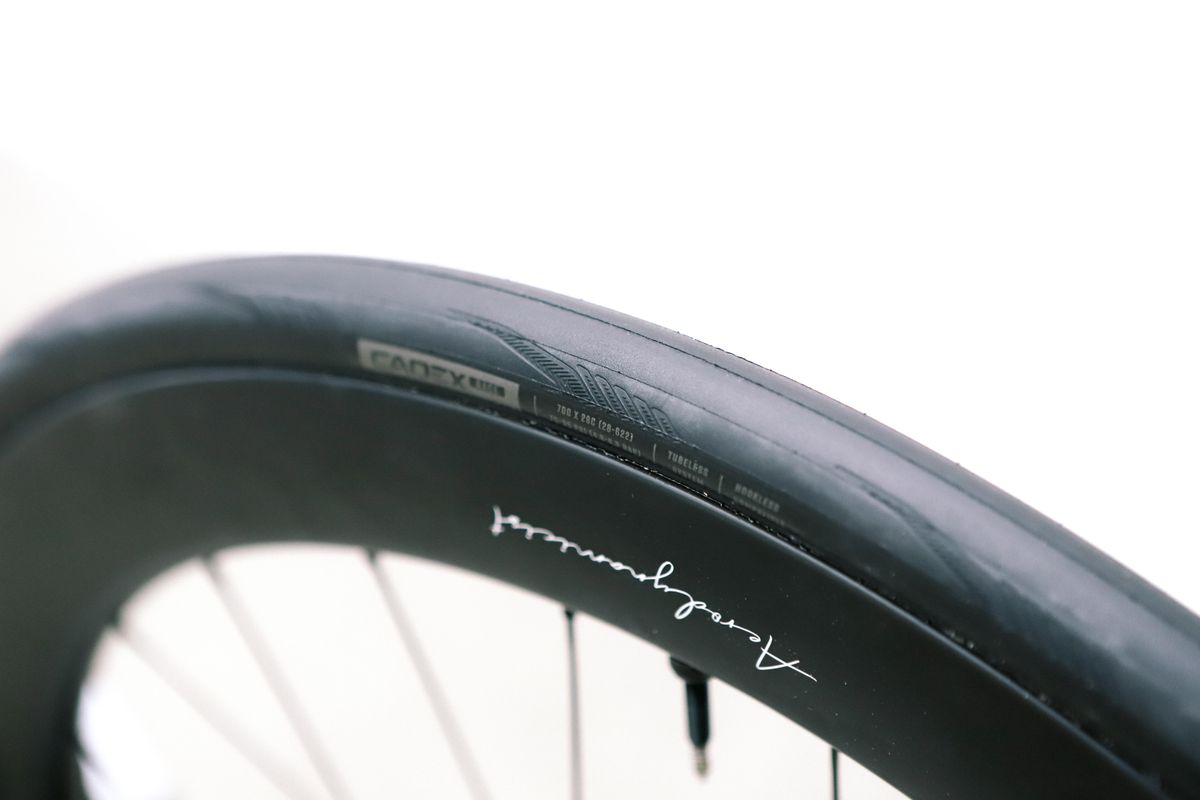 a close up of a black road bike tyre