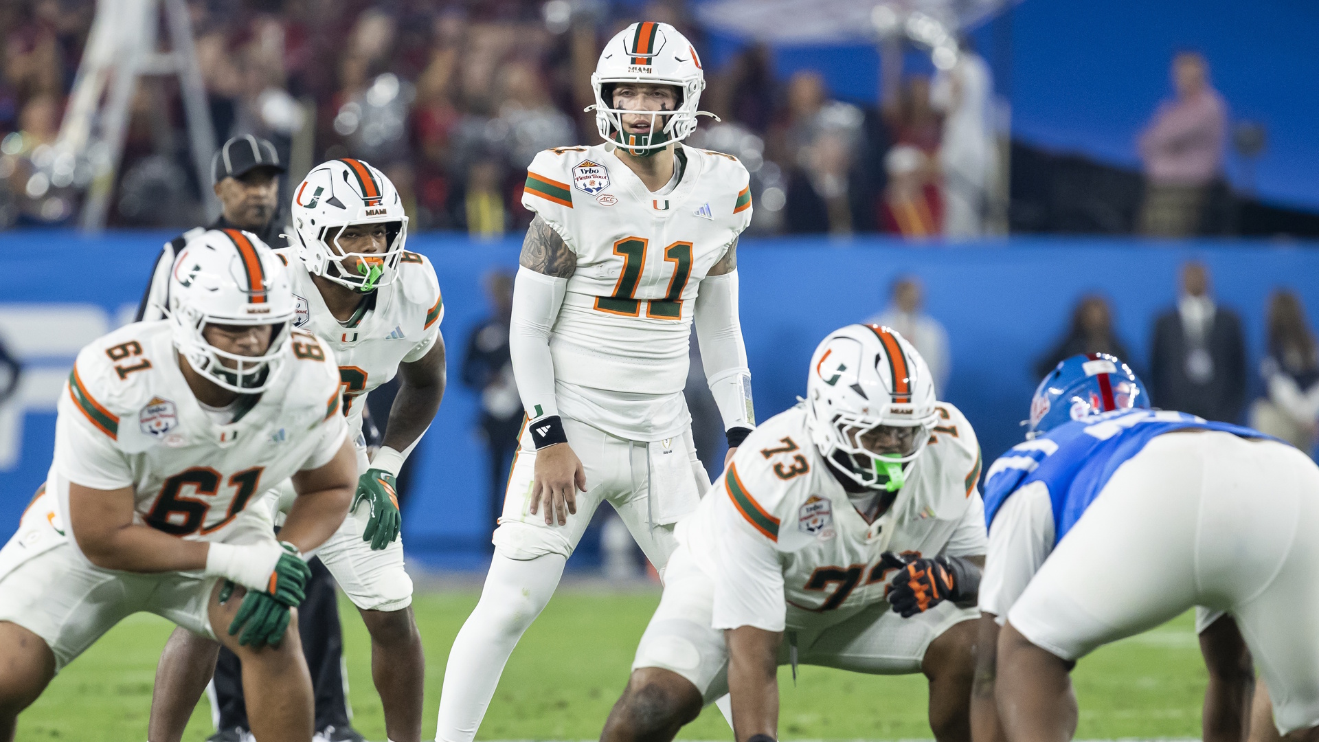 Carson Beck of the Miami Hurricanes prepares for a play during a College Football Playoff game.