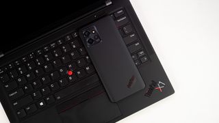 ThinkPhone by Motorola on a Lenovo ThinkPad Carbon X1 laptop