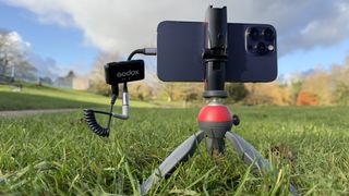 iPhone on a small tripod with a Godox WEC microphone attached
