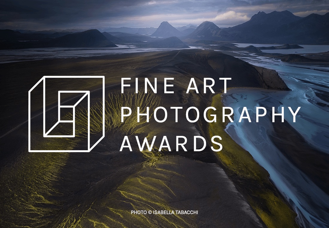 Logo of the Fine Art Photography Awards over a stunning landscape of mountains and rivers, showcasing vibrant colors and dramatic lighting