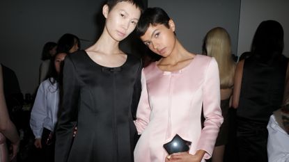 Two models backstage at Sandy Liang