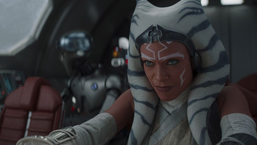 Still from season 1 of the Star Wars TV show Ahsoka. Here we see Ahsoka (orange face with white markings and blue and white striped head tails) piloting a spacecraft trying to leave Peridea.