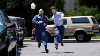 Ruben (Jessie Prez) and Georgie (Montana Jordan) sprinting down the street in Georgie and Mandy's First Marriage season 2