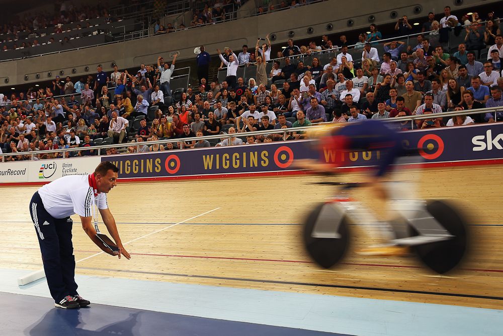 Wiggins' coach tells him to ease back just a bit during his Hour Record attempt.