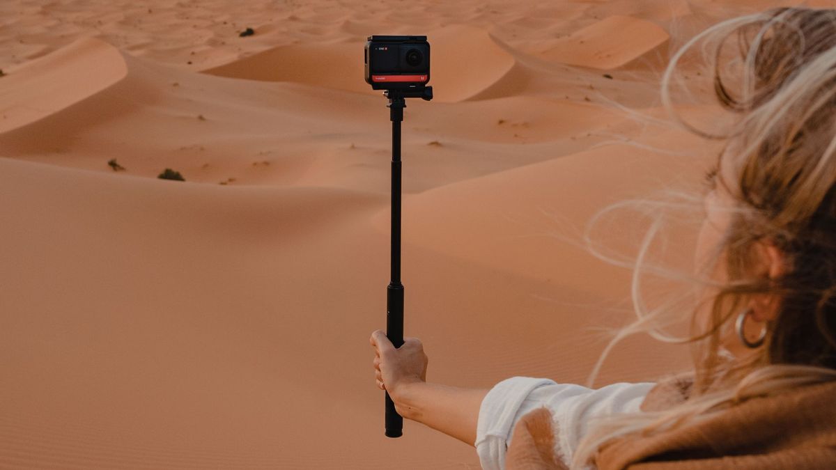 What is an invisible selfie stick and how does the magic work