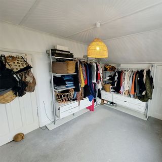 spare bedroom with clothes rails