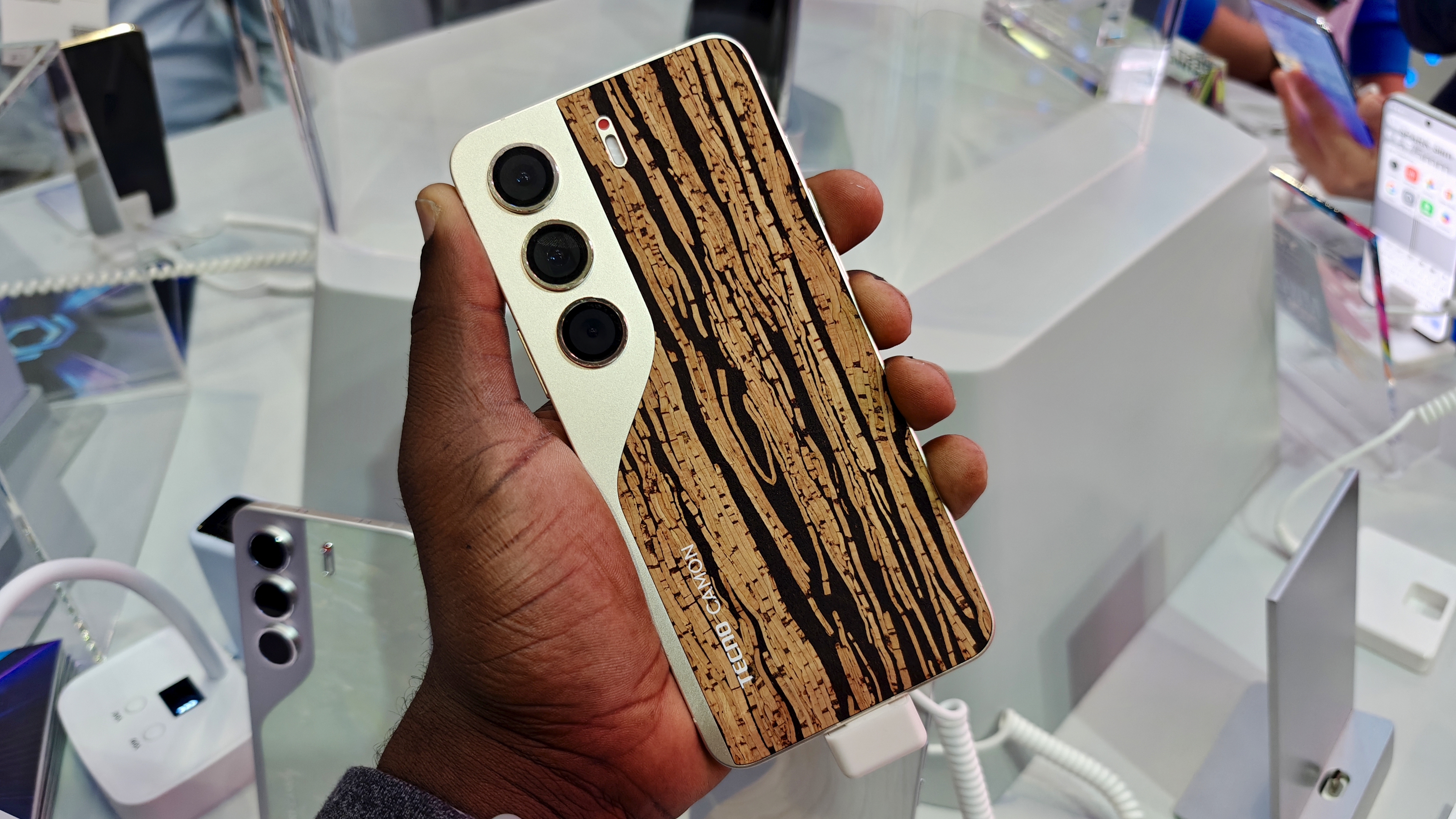 A concept TECNO phone with a back made of coffee grounds