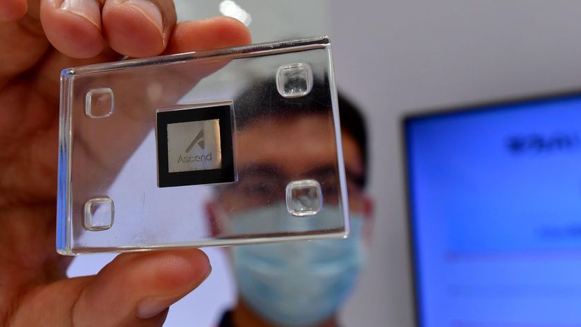 Man holding Huawei Ascend Chip