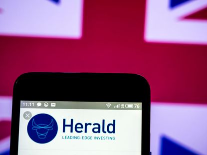 Herald Investment Trust plc company logo seen displayed on a smartphone