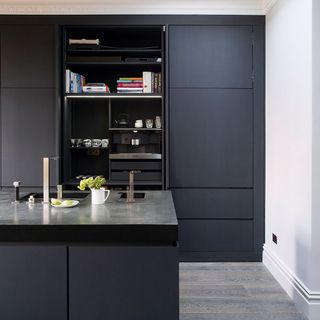 kitchen with grey cabinets and worktop