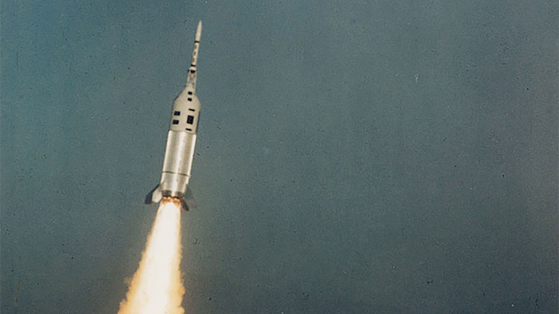 a short, stocky rocket lifts off on an abort test