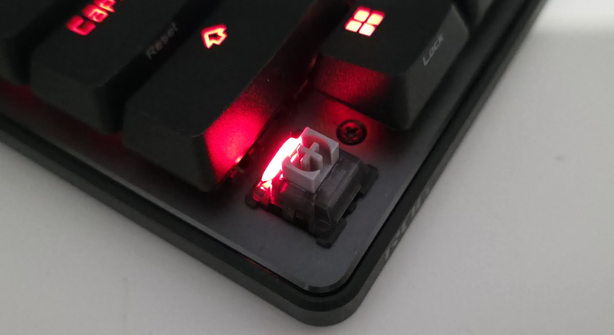 The Asus ROG Falchion Ace HFX keyboard with a keycap removed