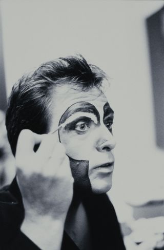 Lipstick, powder and paint, Gabriel gets ready to take to the stage in the mid-80s