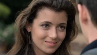 Mia Sara as Sloane smiling in Ferris Bueller's Day Off