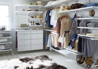 Open storage wardrobe in bedroom