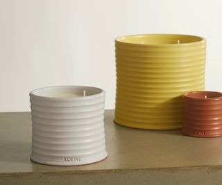 Loewe candle collection in different sizes and colors