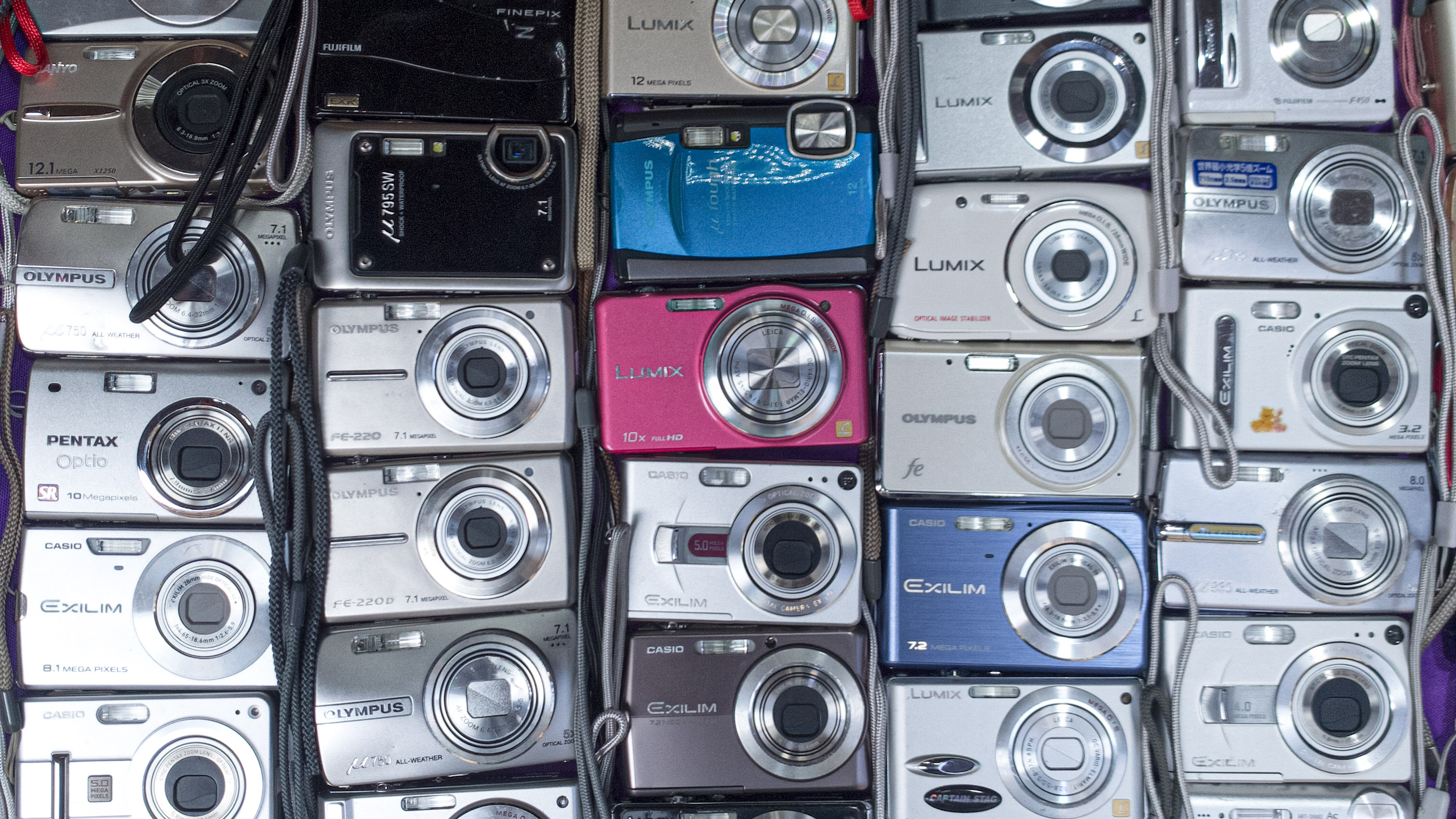 Vendors display a vast collection of vintage digital point-and-shoot cameras for sale at street market on April 30, 2026 in Hong Kong, China. (Photo by Sawayasu Tsuji/Getty Images)