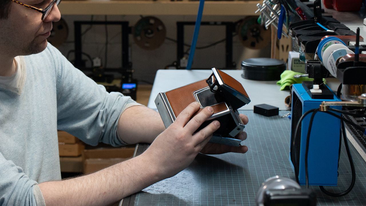 Tear down of the Polaroid SX-70 camera in the Retrospekt workshop during a refurbish