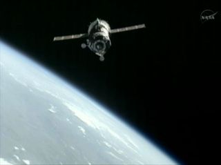 A Soyuz TMA-05M spacecraft nears the International Space Station ahead of docking to deliver three new residents on July 17, 2012.
